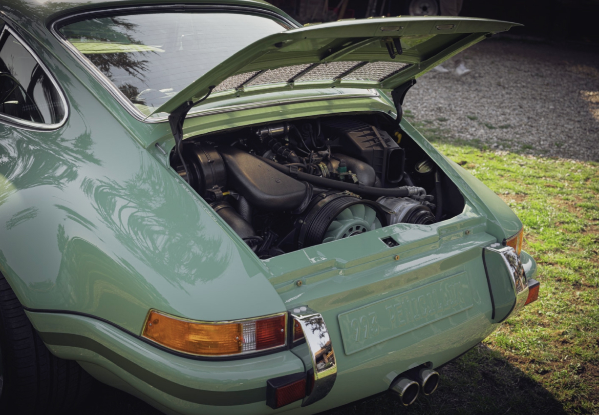 Why doeas the Porsche 911 have a rear engine?